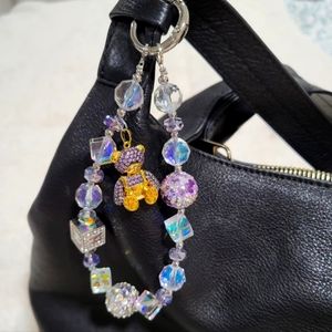 Purple bear bag chain.